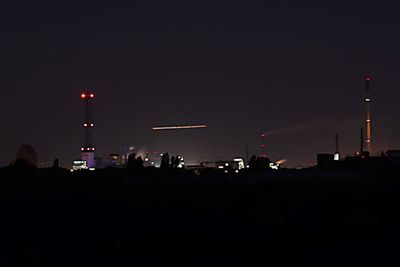 Silhouette of city at night