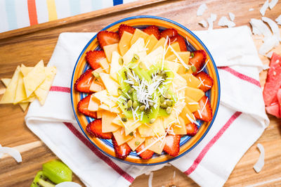 High angle view of fruits in plate on table