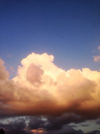 Low angle view of clouds in sky at sunset