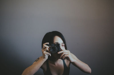 Portrait of man photographing