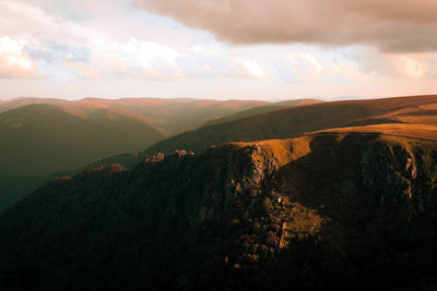 Scenic view of landscape against sky during sunset