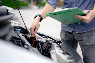 Man working on car