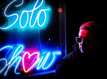 Man with illuminated light painting