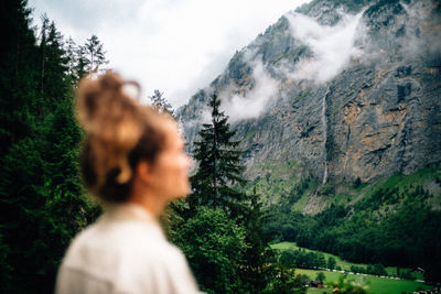 Rear view of man looking at mountain