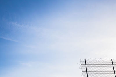 Low angle view of building against blue sky