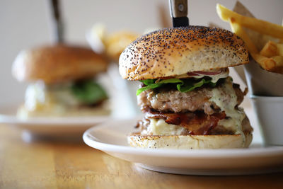 Close-up of burger in plate on table