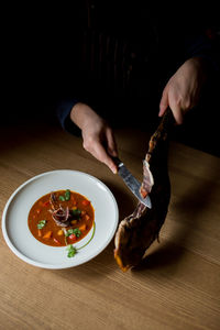 Chef cuts jerky to soup