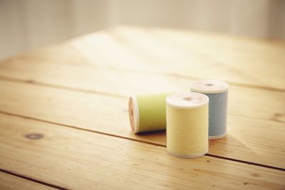 Spools on wooden table