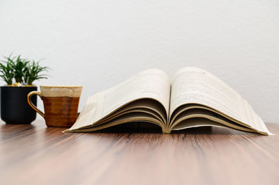 Close-up of open book on table