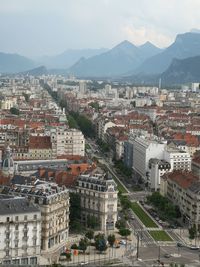 High angle view of buildings in city against sky