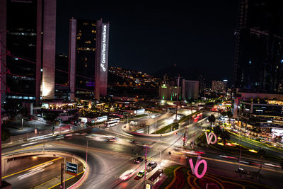High angle view of traffic on city street at night