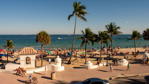 An high angle view of a busy tropical beach scene