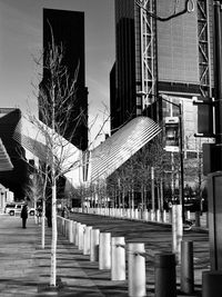 Street amidst buildings in city against sky