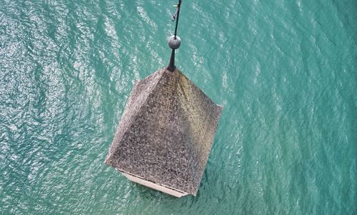 High angle view of umbrella over sea