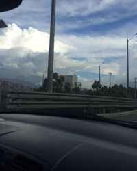 View of road against cloudy sky