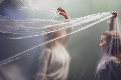 Reflection of woman in water