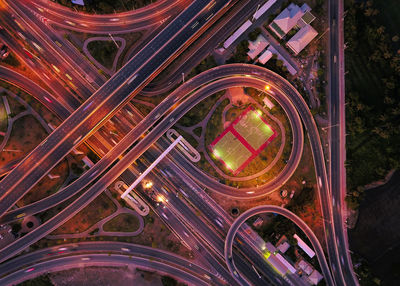 Directly above shot of intertwined highways at night