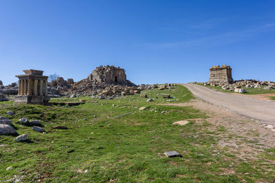 Old ruin building against blue sky