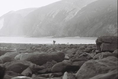 Scenic view of sea against mountain