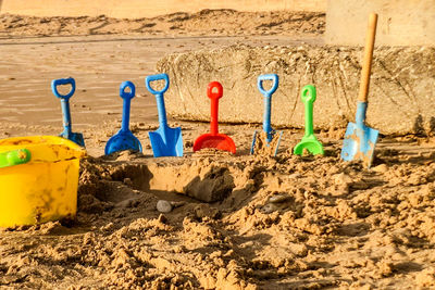 View of toys hanging on beach