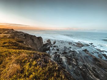 Scenic view of sea against sky during sunset