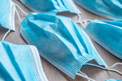 High angle view of clothes and blue background