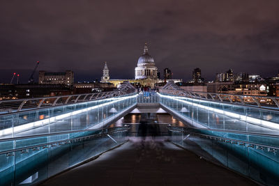 St paul's cathedral and millennium bridge over the river thames in london