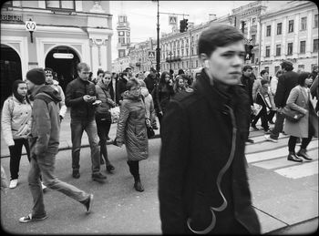 People walking on street in city