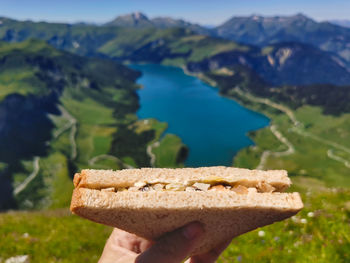 Close-up of hand holding bread