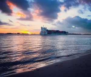 Scenic view of sea against sky during sunset