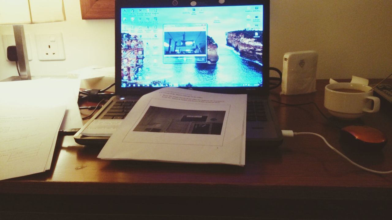 indoors, window, table, chair, technology, home interior, absence, reflection, architecture, no people, empty, built structure, transparent, house, glass - material, vehicle interior, wireless technology, day, laptop, high angle view