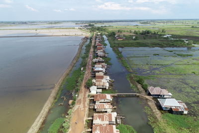 High angle view of road by sea against sky