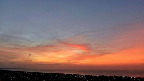 Scenic view of dramatic sky during sunset