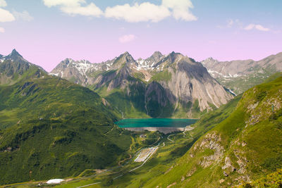 View of morasco dam in val formazza during summer sunset in piemonte, italy