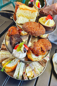 Close-up of food on a tiered plate