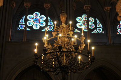 Low angle view of illuminated lights in building