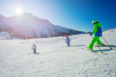 Man skiing on snow covered mountain