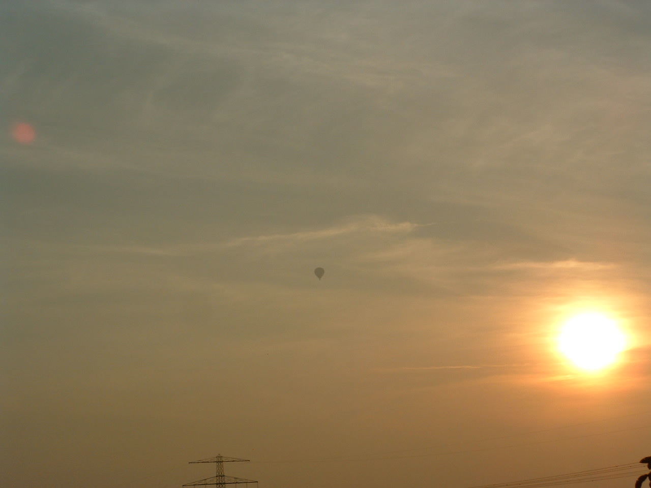 SILHOUETTE OF BIRD FLYING AGAINST SKY DURING SUNSET