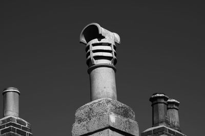 Low angle view of bell tower against sky