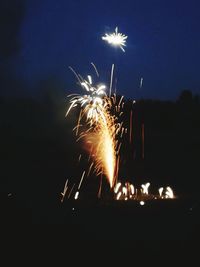 Firework display at night