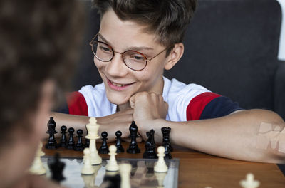 Boy playing chess