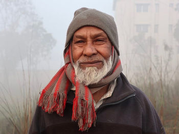 Portrait of man wearing hat during winter