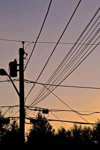 Low angle view of electricity pylon