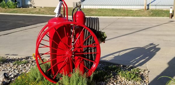 High angle view of red wheel on road