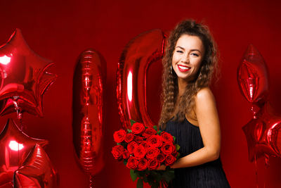 Portrait of smiling young woman