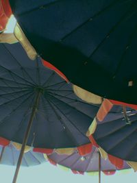 Low angle view of multi colored umbrellas