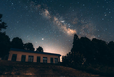 Low angle view of building against sky at night