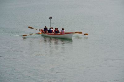 People on boat in sea