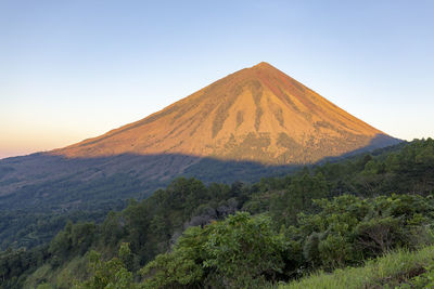 Scenic view of mountains against clear sky