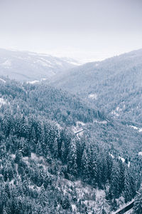 Aerial view of landscape against sky during winter
